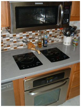 Convection microwave, (2) DuxTop induction units in-quartz-counter and oven under completed. CLICK for large image